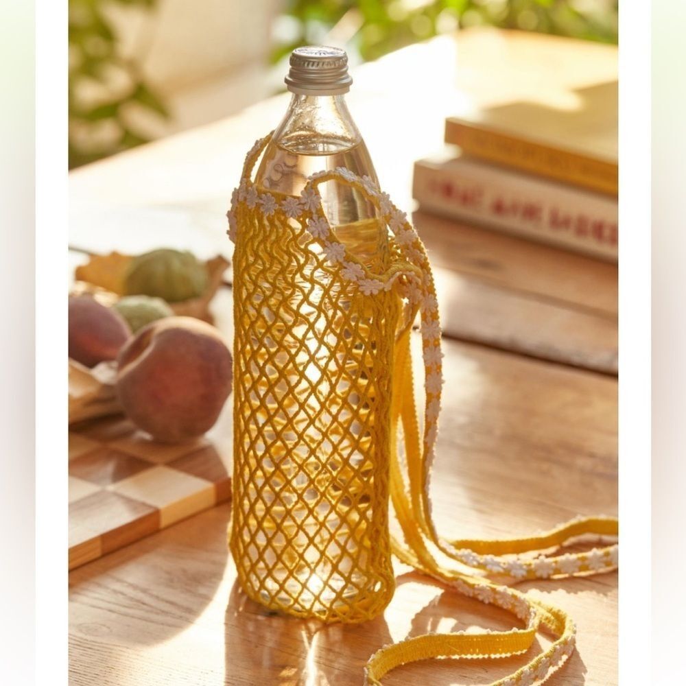 Urban Outfitters Daisy Trim Bottle Sling